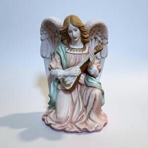 O'Well Grandeur Noel porcelain angel figurine playing a mandolin/guitar.